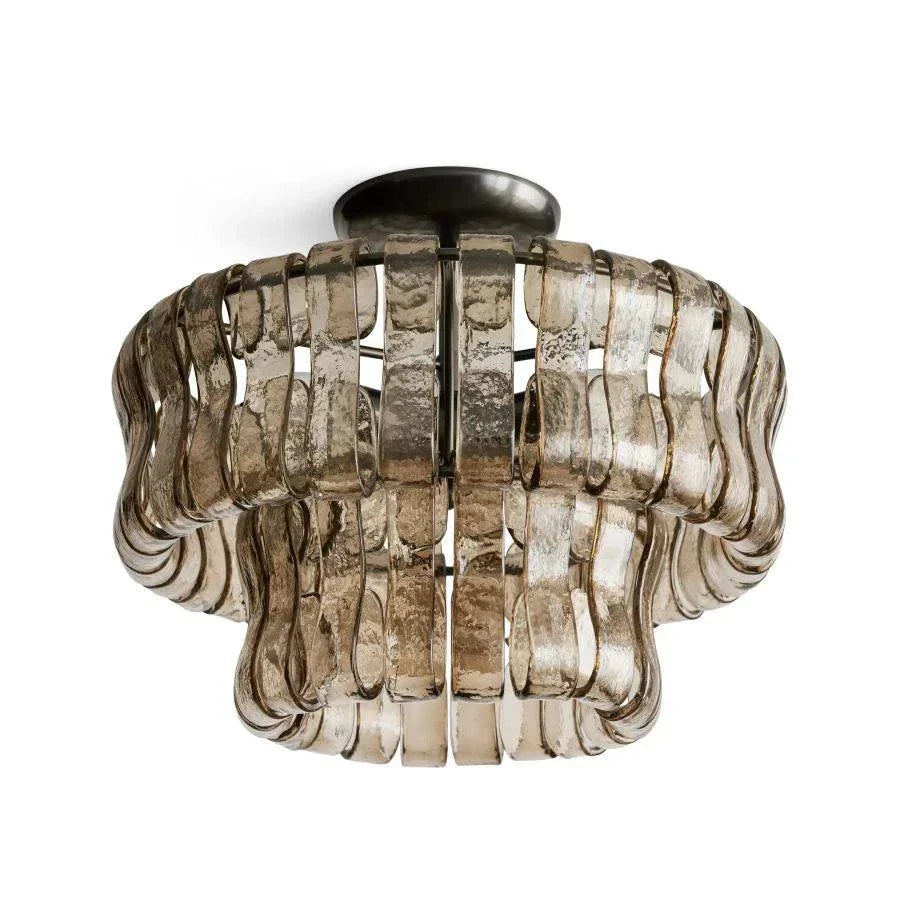 Ghiaccio Glass Flushmount light with antique brass and matte black finish.