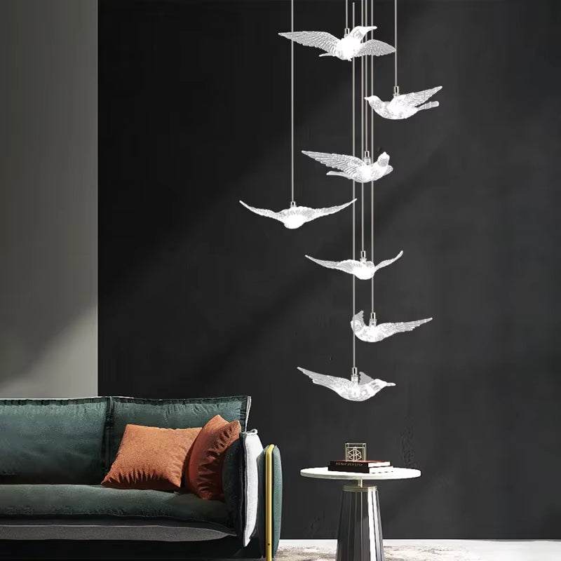 Modern bird acrylic chandelier with LED lights and stainless steel body hanging in living room