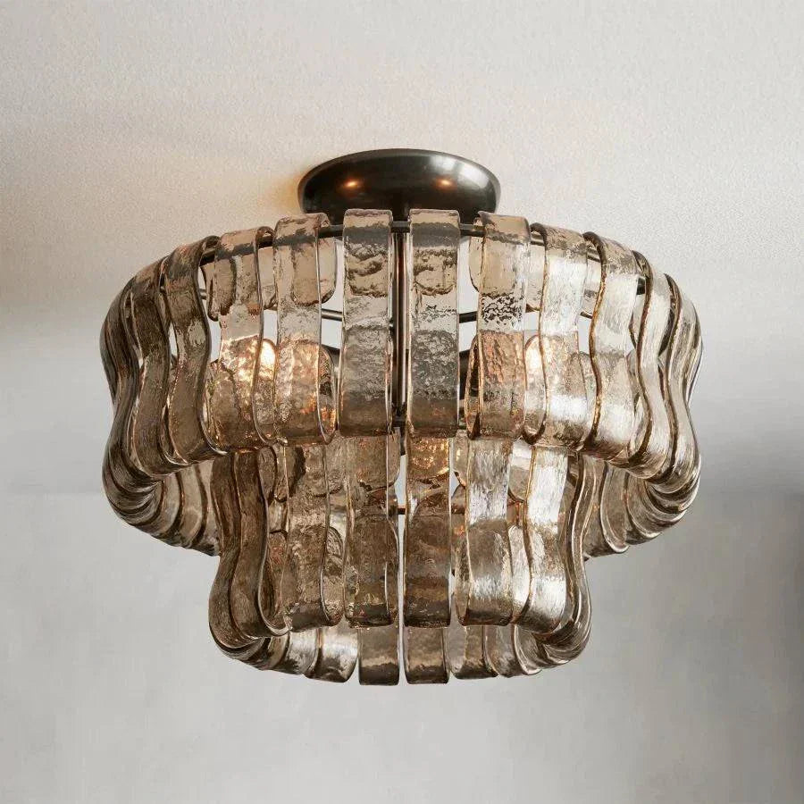 Ghiaccio Glass Flushmount with antique brass finish, featuring elegant glass design and three E12 dimmable bulbs.
