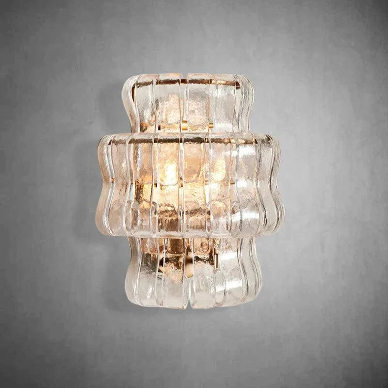 Ghiaccio Glass Wall Sconce with antique brass finish and metal-glass design.