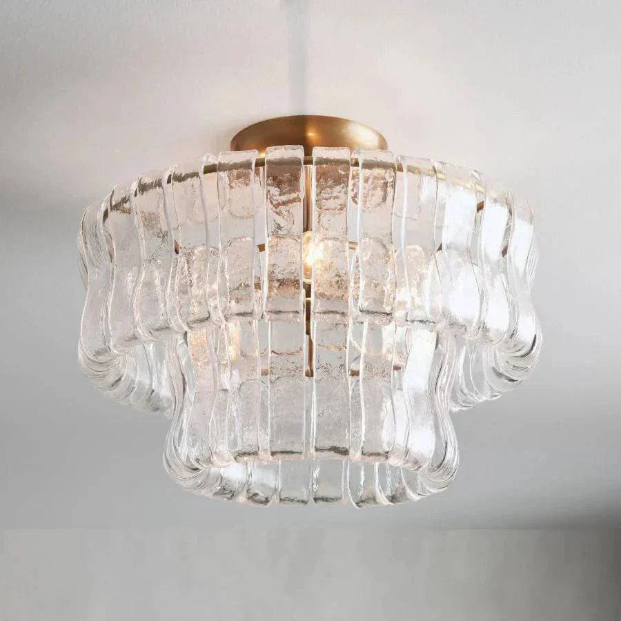 Ghiaccio Glass Flushmount with antique brass and matte black finish, featuring metal and glass construction.