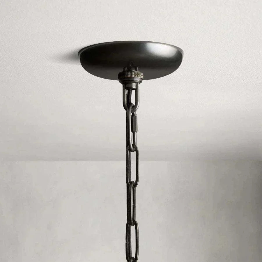 Matte black canopy and chain detail of the Ghiaccio Glass Round Chandelier.