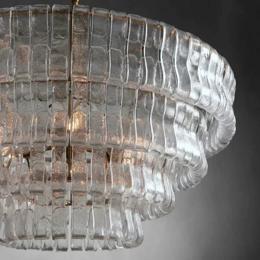 Ghiaccio Glass Round Chandelier with textured glass and antique brass finish.
