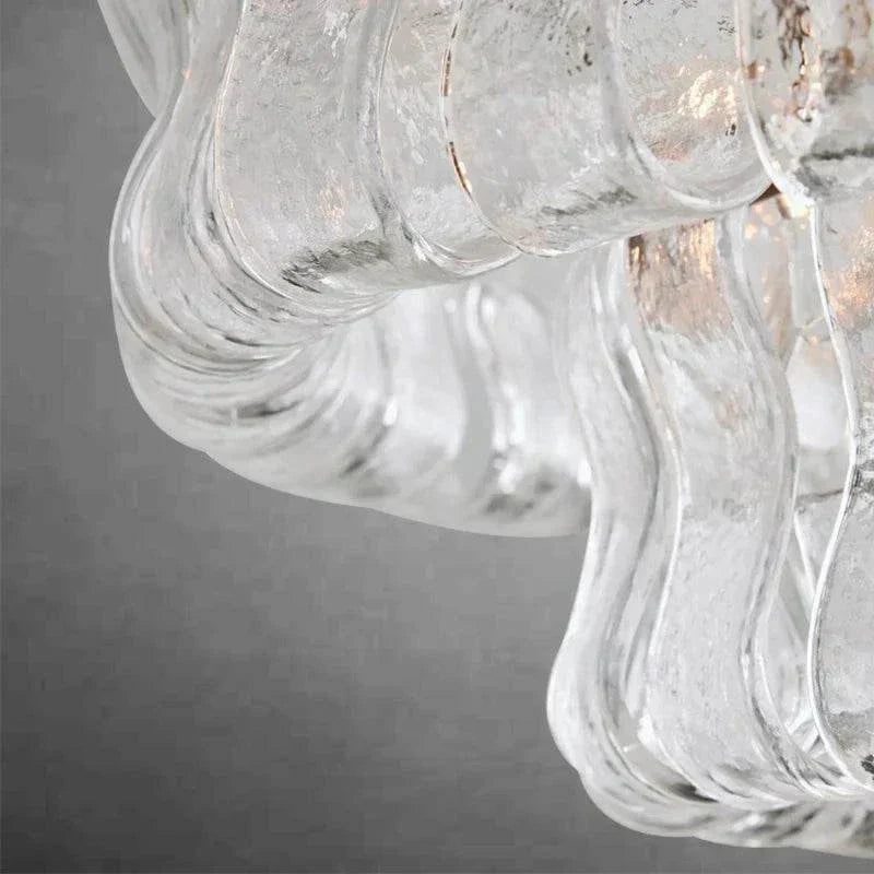 Ghiaccio Glass Flushmount with antique brass and matte black finish.