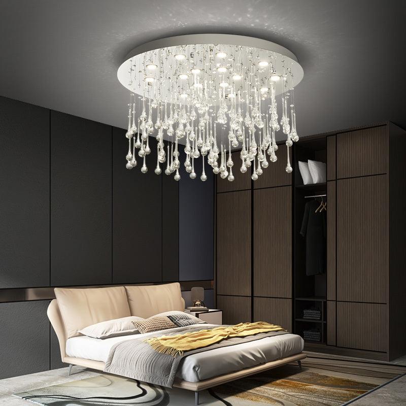 Modern Pangli Ceiling Lamp with crystal water drop design, 4 size options, installed in a stylish bedroom.