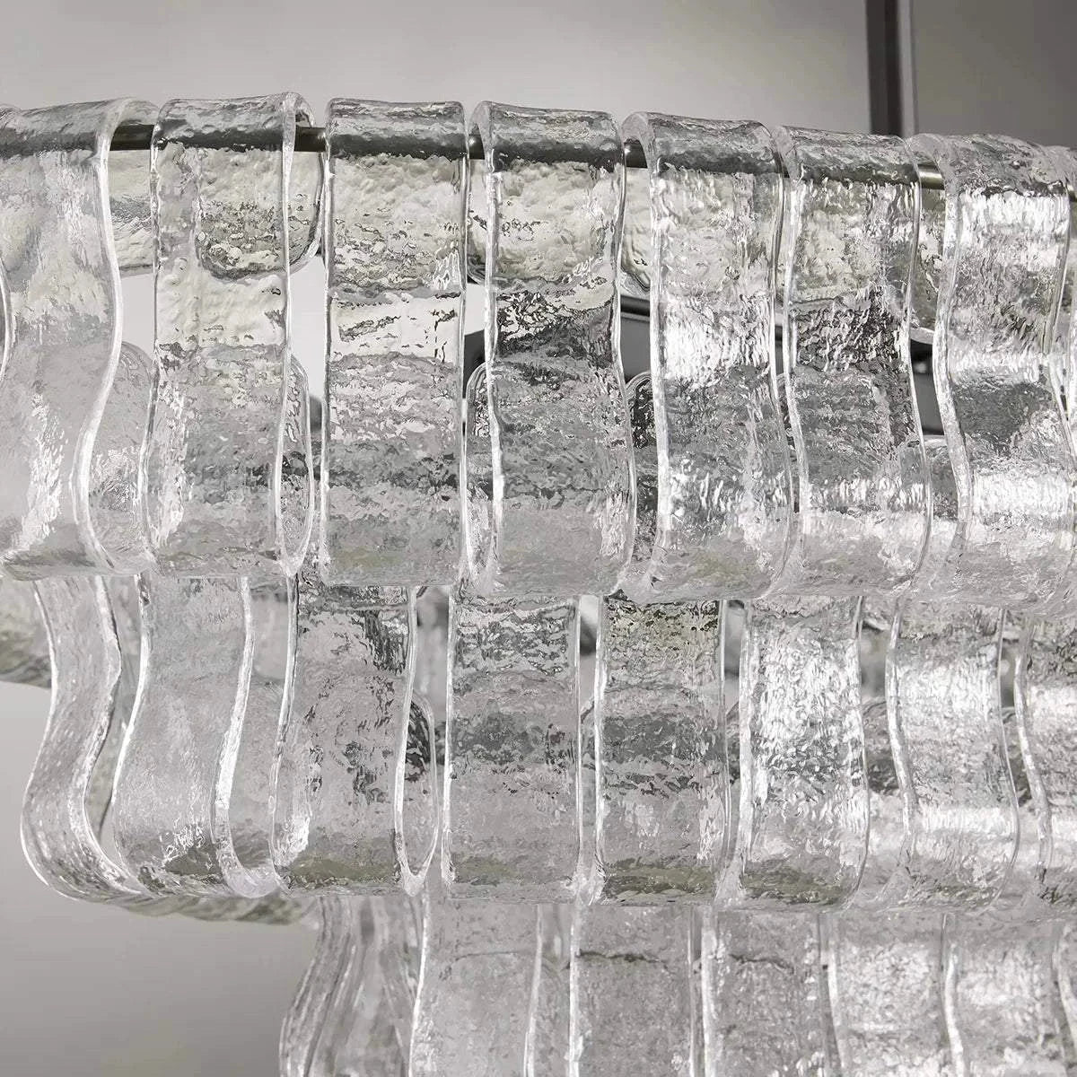 Ghiaccio Glass Oval Chandelier with textured glass panels.