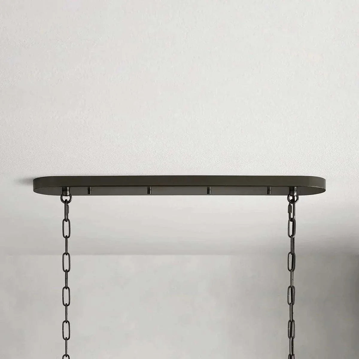 Ghiaccio Glass Oval Chandelier with metal and glass design, ideal for dining room and living spaces.