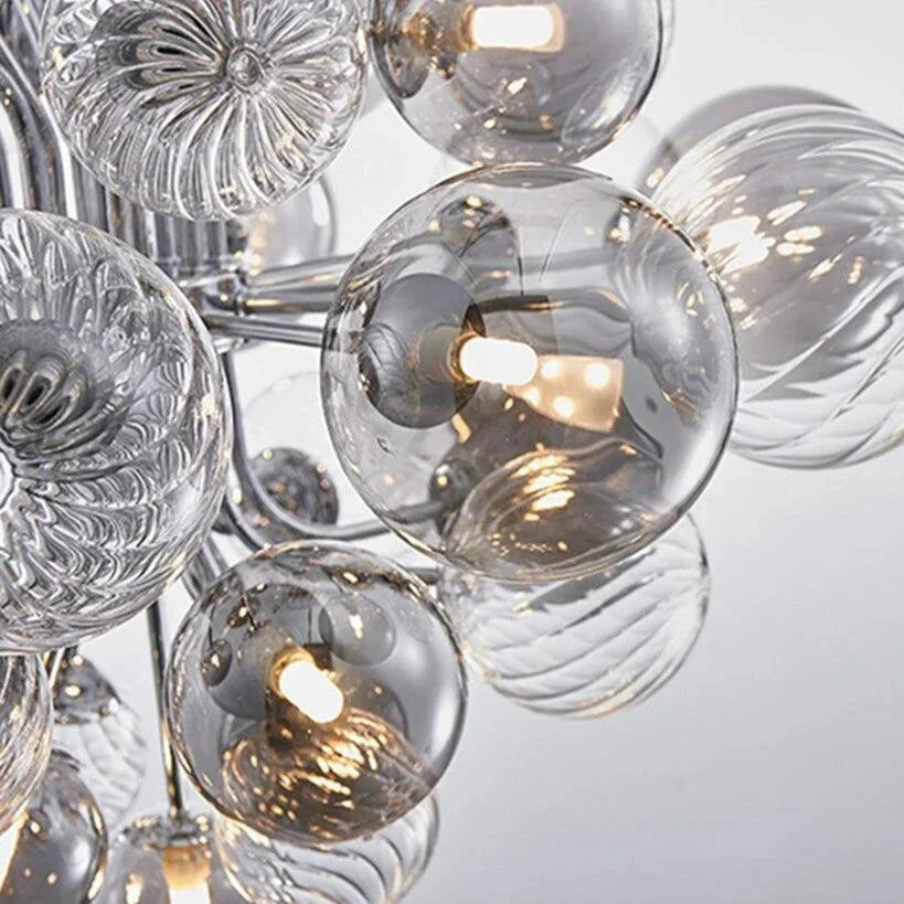 Modern Glass Bubble Chandelier with LED bulbs and chrome finish.