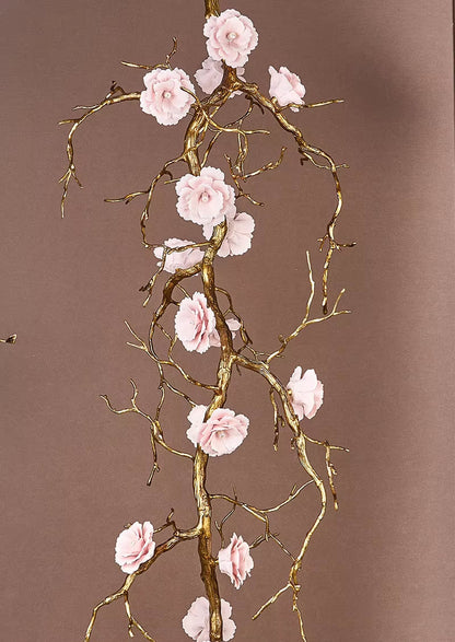 Elegant all-copper branch chandelier with ceramic flowers and warm light