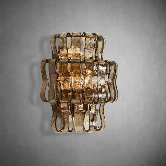 Ghiaccio Glass Wall Sconce with antique brass and matte black finish, featuring metal and glass design.
