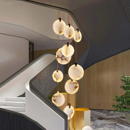 Snowflake Plaster Chandelier in a modern lobby stairwell.