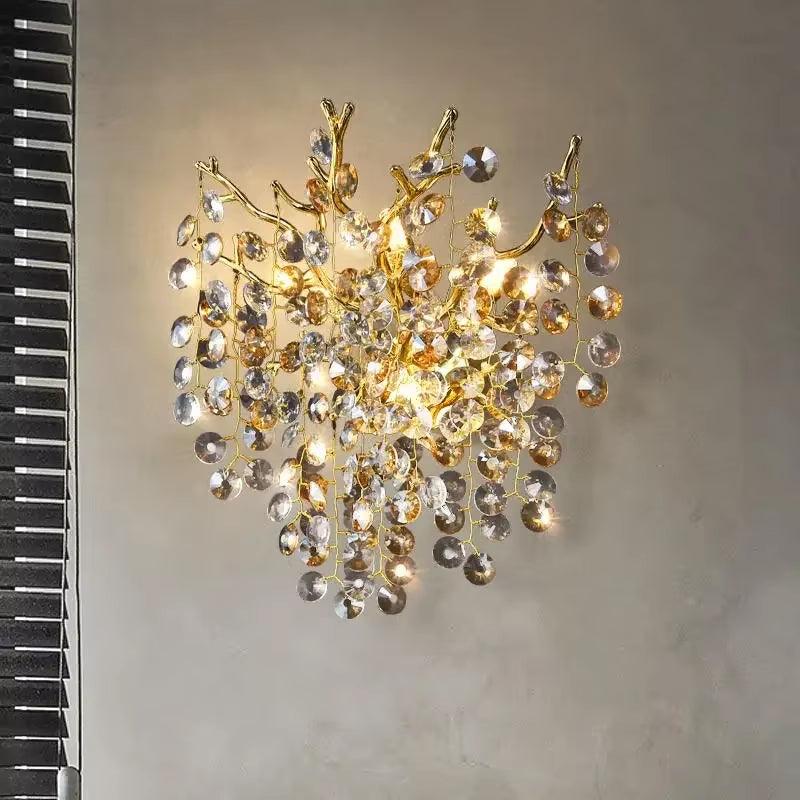 Celestial Collection Crystal Wall Sconce with gold frame and transparent crystals, modern style.