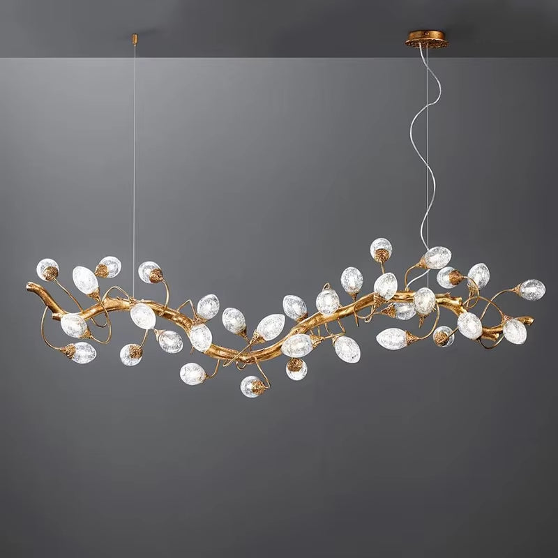 Modern brass and crystal ball branch chandelier with fruit-shaped glass spheres and G9 light sources