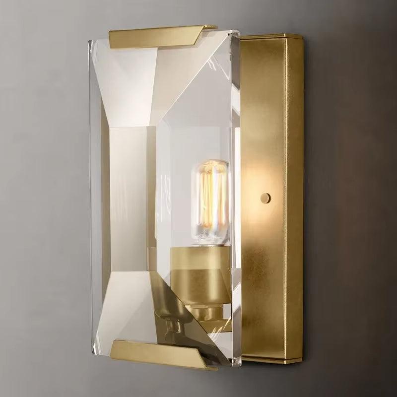 Crystal wall sconce with LED light and metal-crystal design for warm or cold white ambiance.