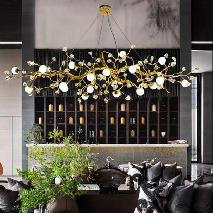 Elegant glass globe pendant light with crystal chandelier and golden-brown finish
