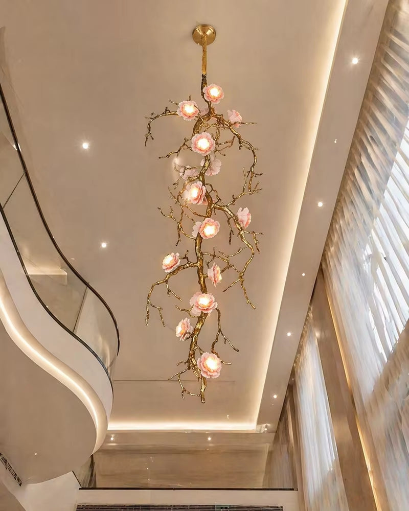 All-copper branch chandelier with ceramic flowers and warm light