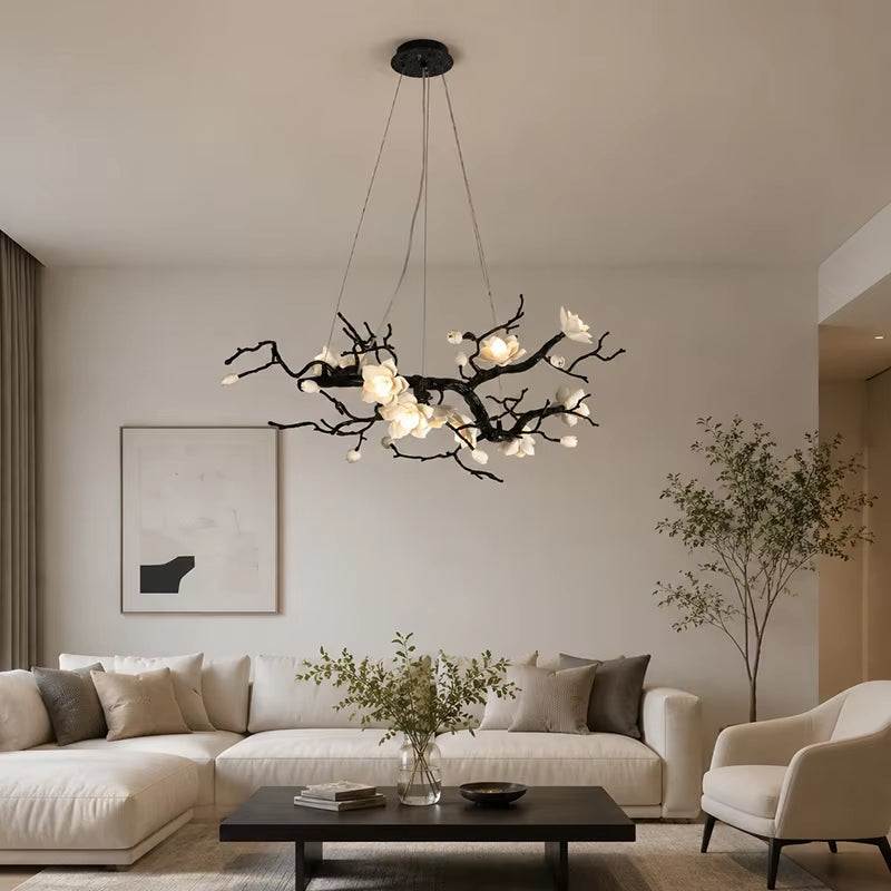 Modern all-copper magnolia pendant light with ceramic flowers and adjustable suspension cable
