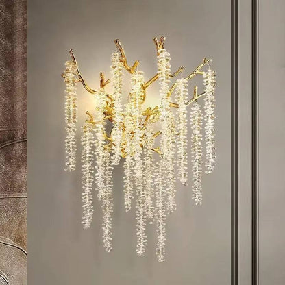 Celestial Collection Crystal Wall Sconce with gold and transparent crystals, modern design.