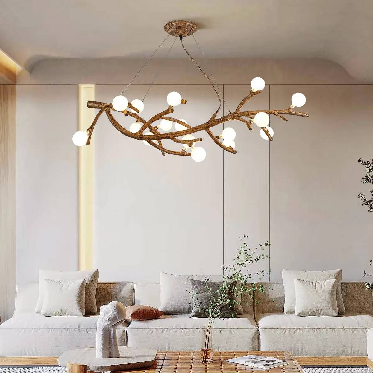 Modern tree branch chandelier with 42 frosted glass lights and adjustable hanging wire in living room setting
