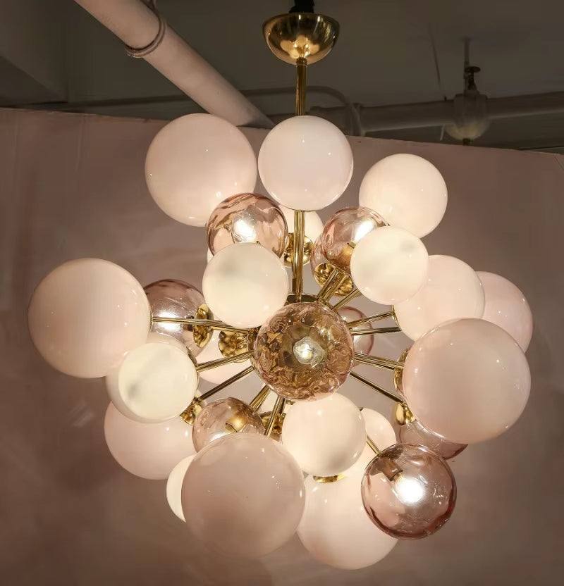 Modern pink bubble glass chandelier with metal frame and LED bulbs for living room and dining room lighting