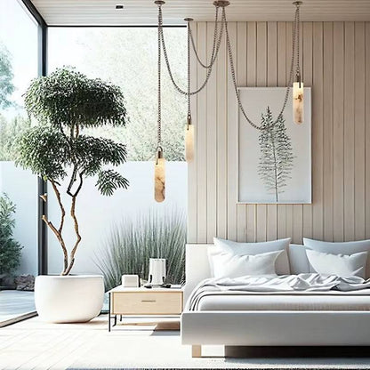 modern bedroom with Spanish marble chain chandelier pendant lights above bed