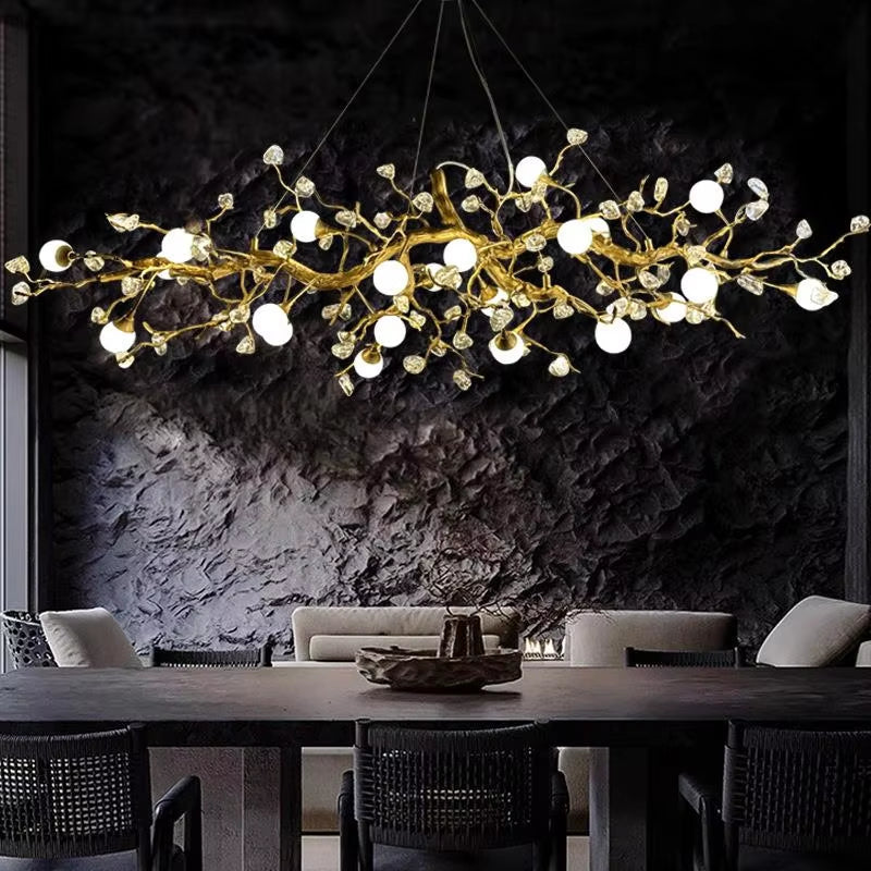 Elegant glass globe pendant light with crystal chandelier and golden-brown finish