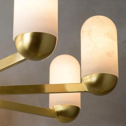 Close-up of Spanish marble chandelier with natural marble and brass pendant lights