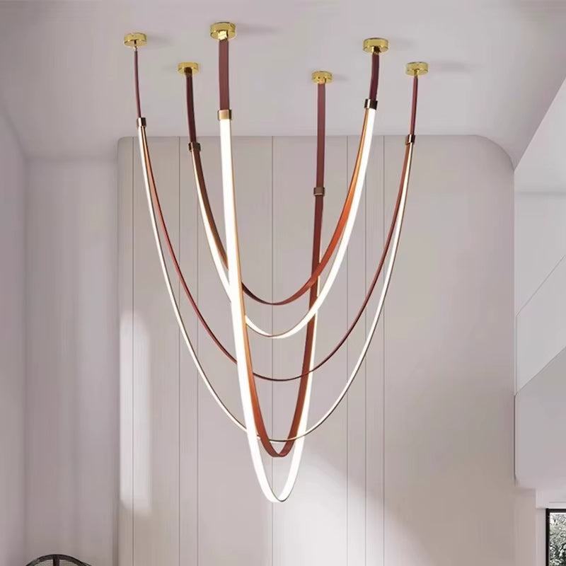 Modern DIY Belt LED Chandelier with adjustable leather straps and gold fixtures hanging from ceiling