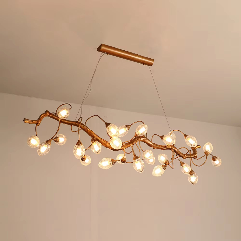 Brass and crystal ball branch chandelier with fruit-shaped crystal spheres and G9 light sources in golden brown finish