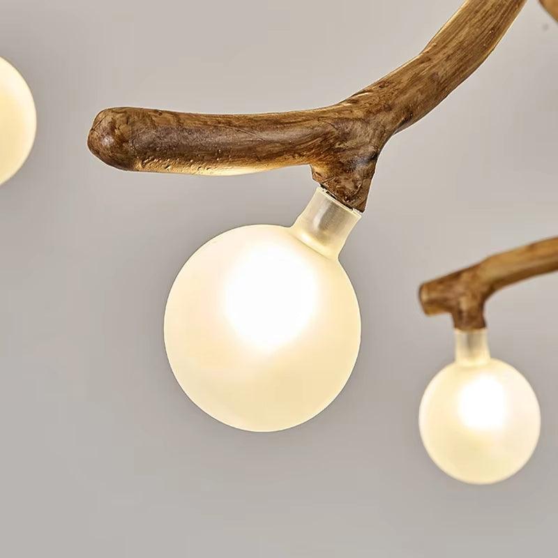 Modern tree branch chandelier with 42 frosted glass lights and resin-metal branches