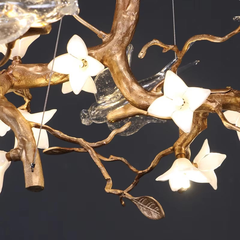 Modern Glass Bird Crystal LED pendant light with copper and glass flower design in golden brown color