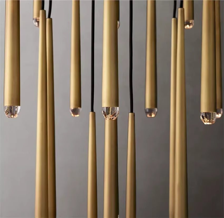 Modern conical metal chandelier with stainless steel and crystal accents hanging in warm and cold LED light options