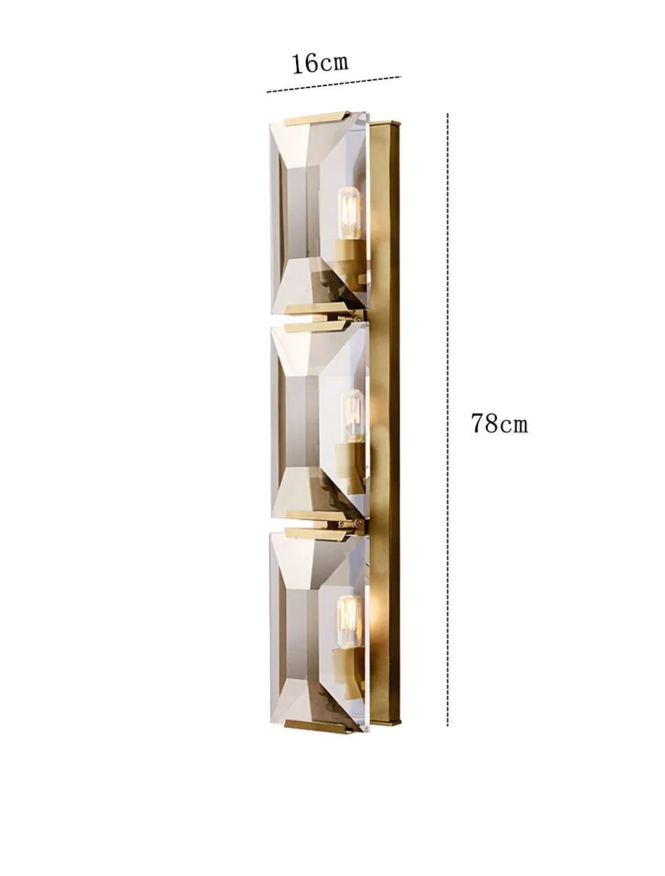 Crystal wall sconce with metal and crystal design featuring three lights, suitable for living room, dining room, and bedroom.