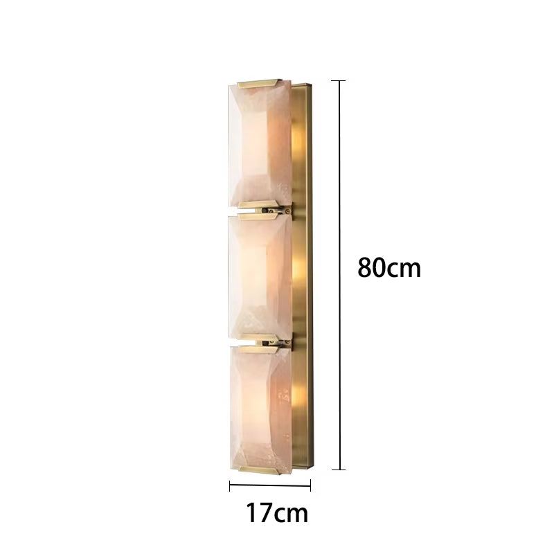 Modern Calcite Crystal Wall Sconce with stainless steel frame and LED light bulbs, suitable for living room, dining room, or bedroom.