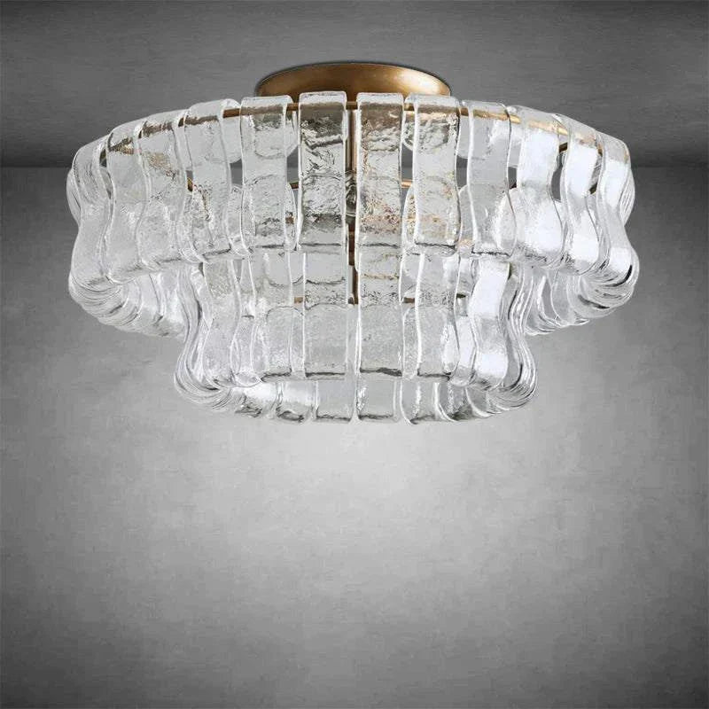 Ghiaccio Glass Flushmount with antique brass finish and clear glass design.