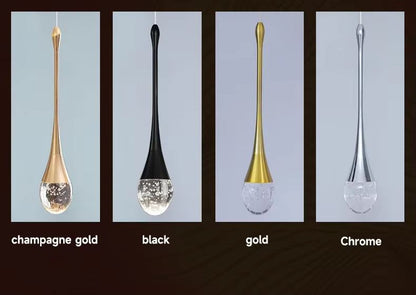 Modern long water drop chandelier in champagne gold, black, gold, and chrome finishes with LED light source.