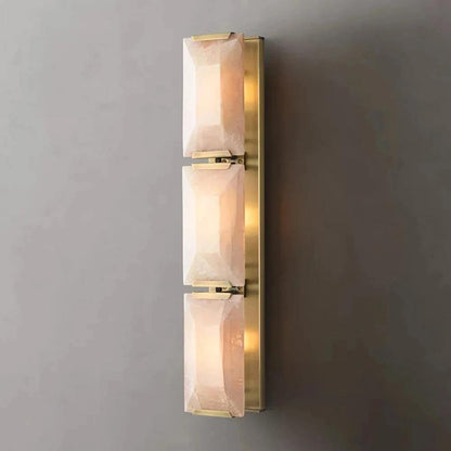 Modern stainless steel and calcite crystal wall sconce with warm and cool LED lighting, suitable for living, dining, or bedroom.