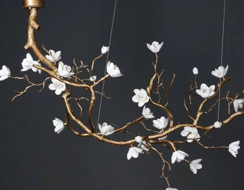 Deluxe all brass ceramic chandelier with white ceramic flowers and copper branches, modern minimalist style.