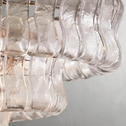 Ghiaccio Glass Oval Chandelier with textured glass detail and metal frame.