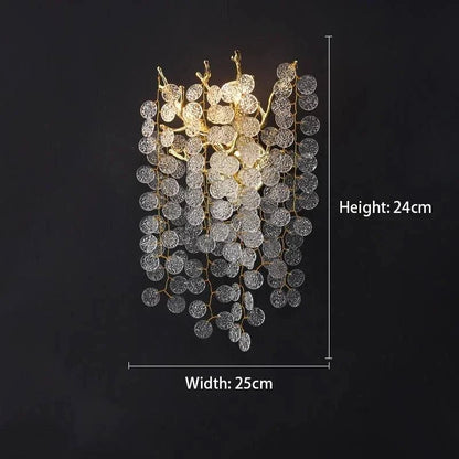 Celestial Collection Crystal Wall Sconce with gold and transparent crystal design.