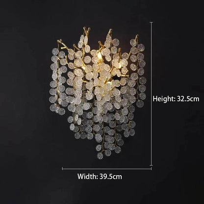 Celestial Collection Crystal Wall Sconce in gold and transparent crystal with LED bulb.