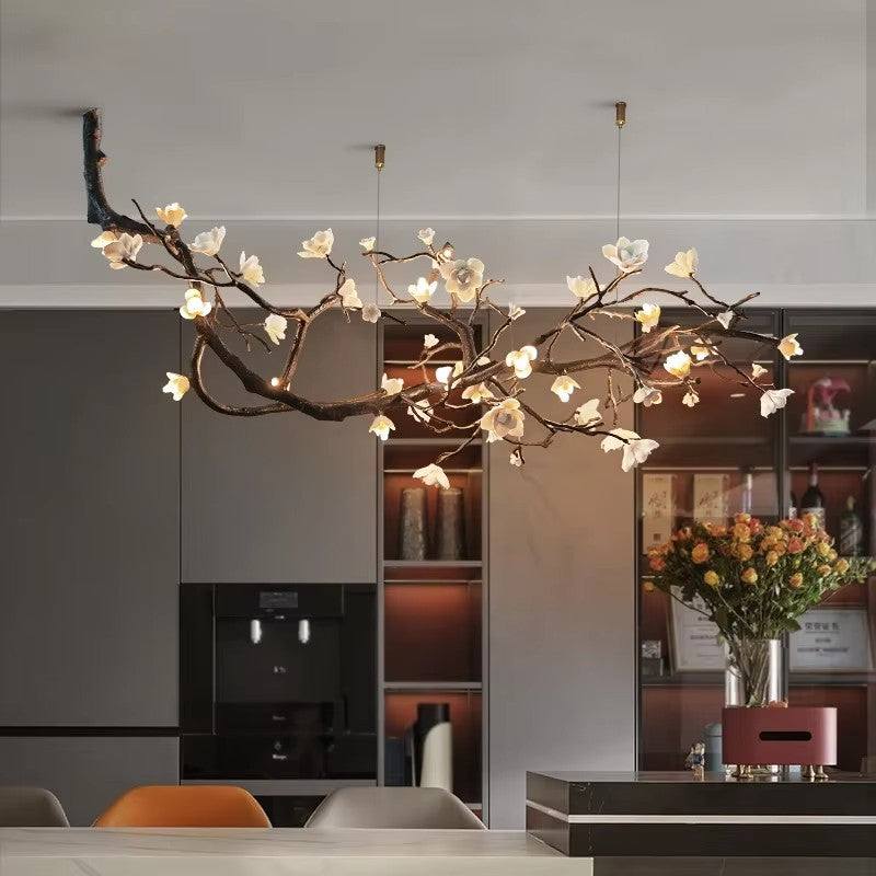 Brass ceramic chandelier with floral design, suitable for modern interiors.