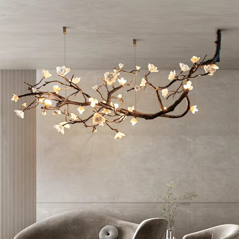 Modern minimalist brass ceramic chandelier with floral design, suitable for living rooms and high-end spaces.